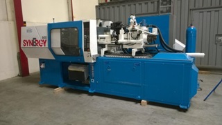 1 Presse à injecter le plastique
